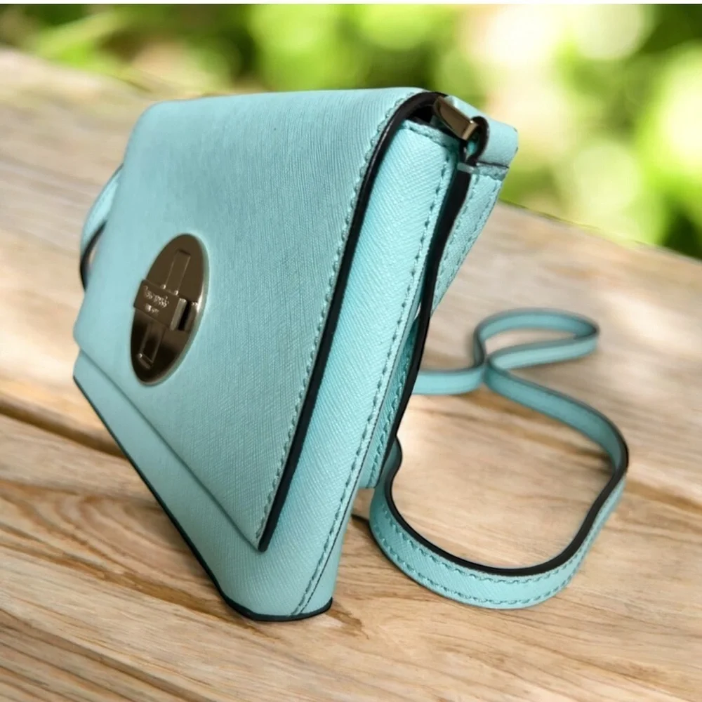 Kate Spade Light Blue Crossbody Bag with Gold Accents